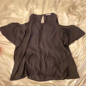 Lush flowing crepe top with shoulder cutout